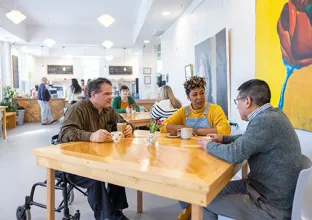 3 people dining at a table